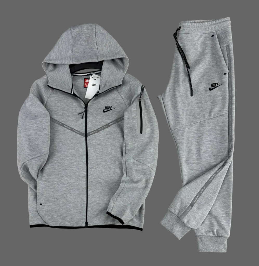Męski dres Nike Tech Fleece, klasyczny szary, z elementami odblaskowymi i kieszenią na rękawie