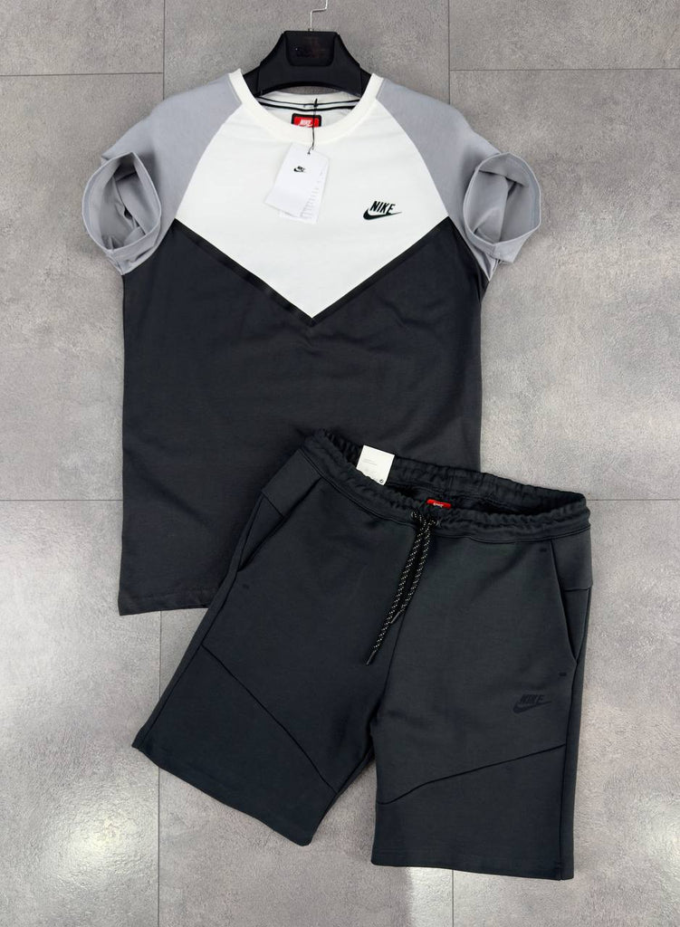 Męski zestaw Nike Tech Fleece, składający się z czarnych spodenek i białej, szarej i czarnej koszulki. Jakość premium.