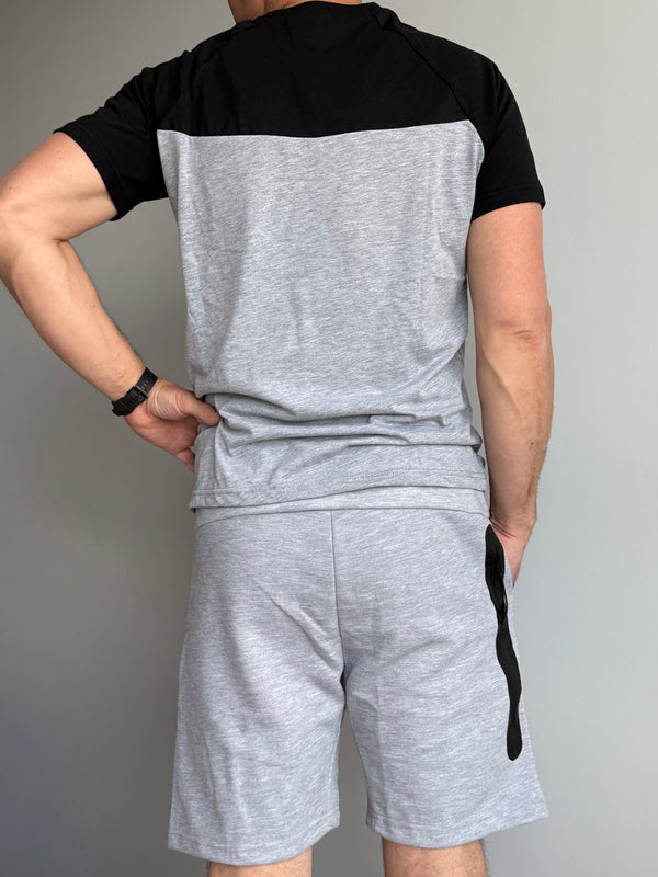 Męski zestaw Nike Tech Fleece, czarno-szara koszulka i szare spodenki. Jakość premium.