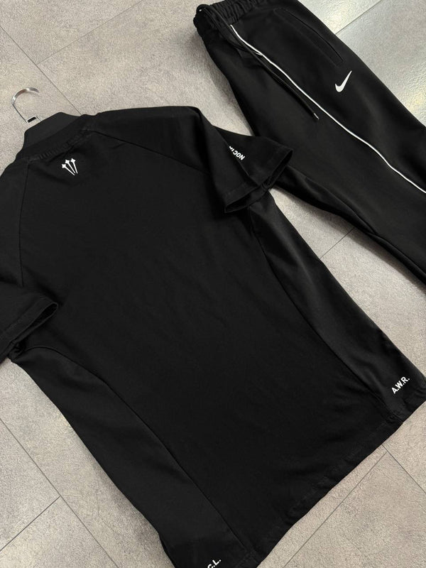 Moški komplet Nike 'Nocta', majica in dolge hlače v črni barvi, z logotipom na rokavu