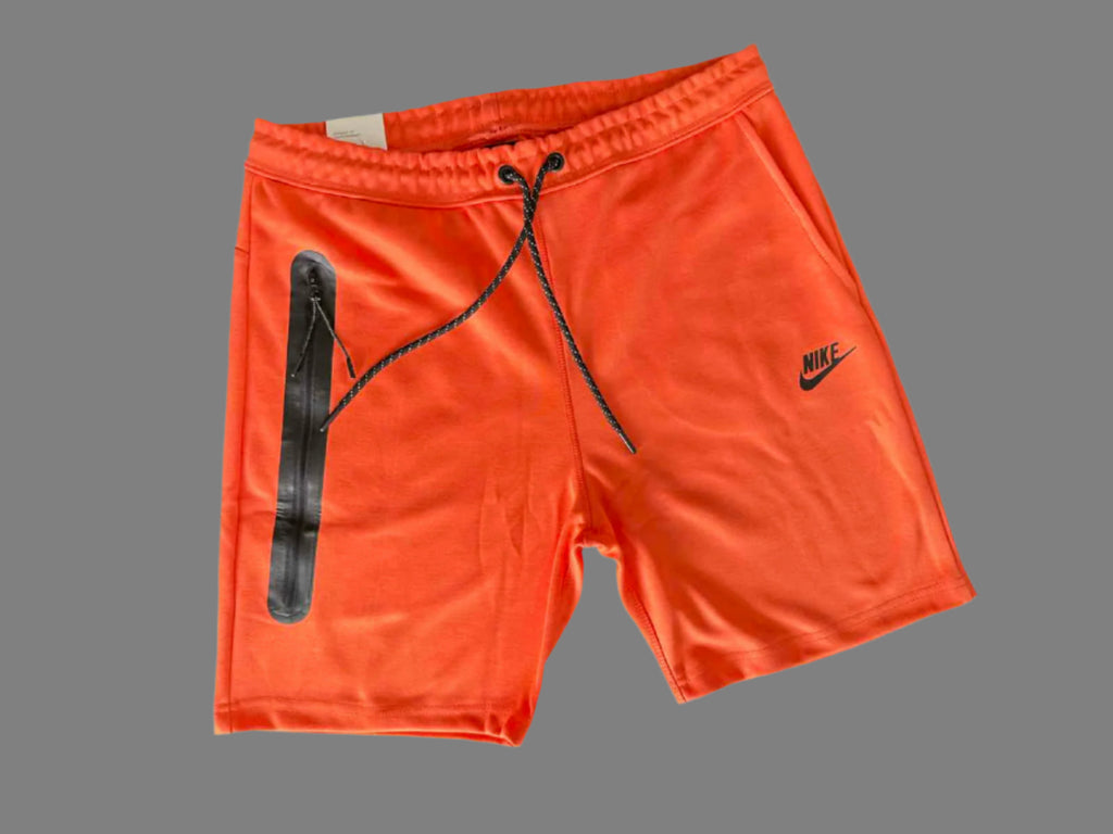 Spodenki sportowe Nike Tech Fleece dla mężczyzn, pomarańczowe.