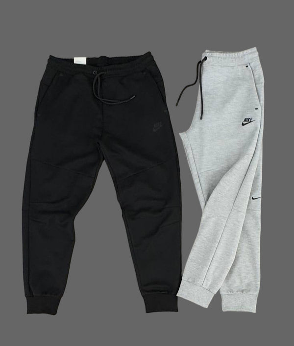 Spodnie dresowe Nike męskie, klasyczna szarość.