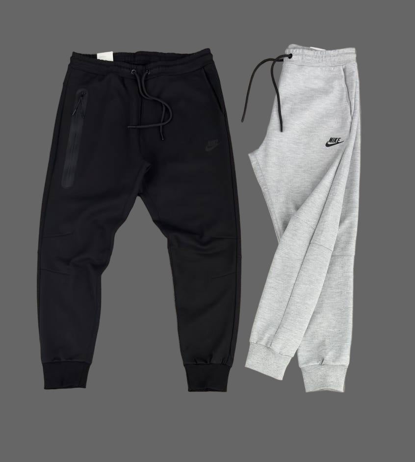 Spodnie męskie Nike Tech Fleece, klasyczna szarość, z kieszenią na zamek na prawej nogawce