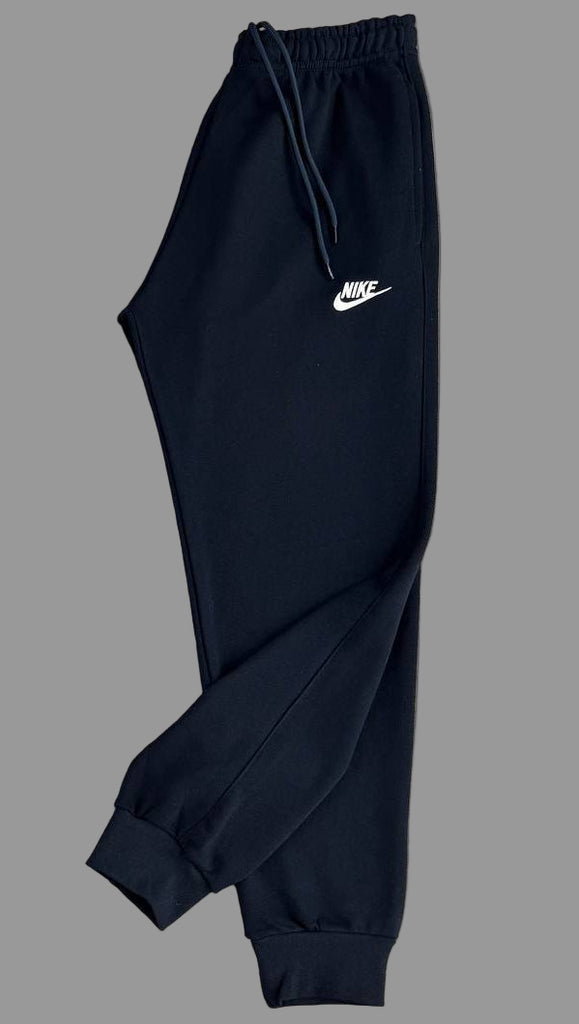 Spodnie dresowe Nike męskie, granatowy z białym emblematem