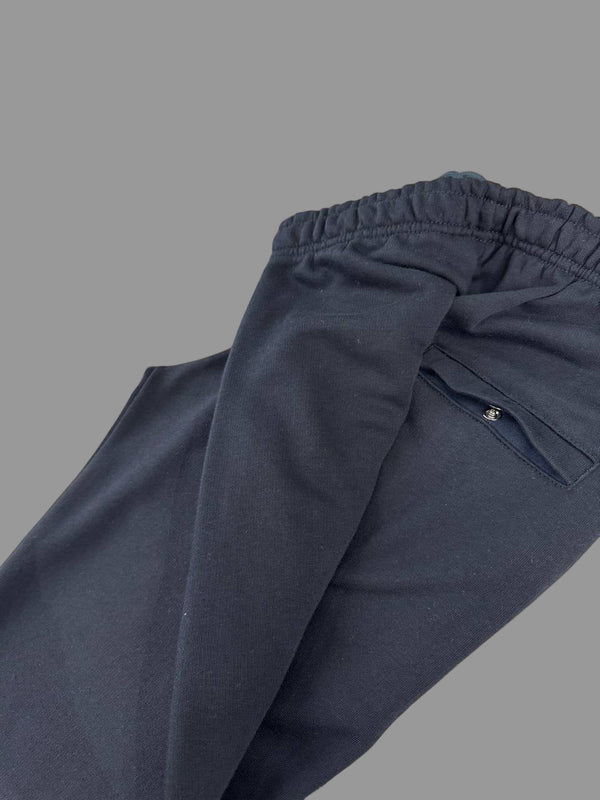 Spodnie dresowe Nike męskie, granatowy z białym emblematem