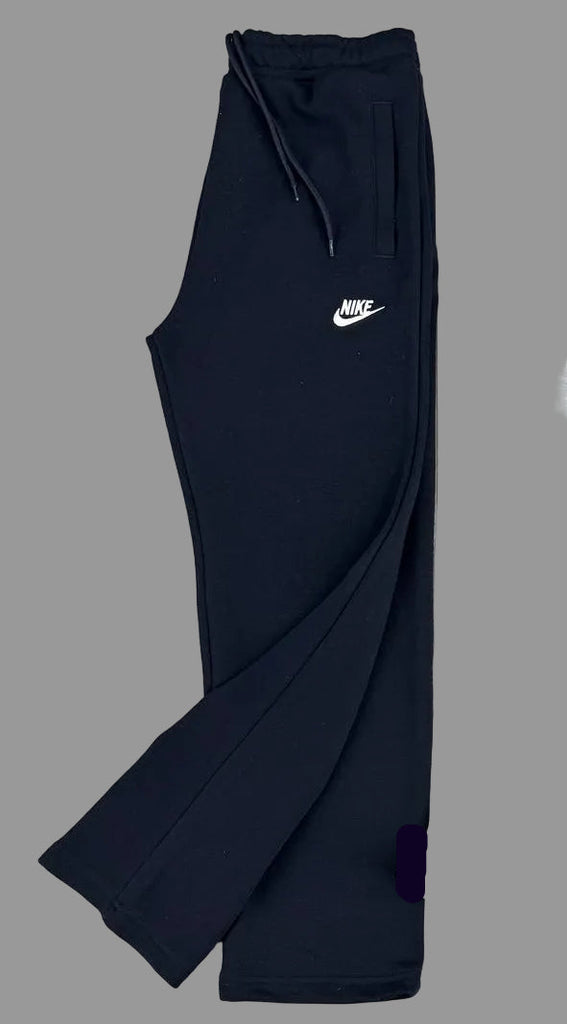 Męskie spodnie dresowe Nike, granatowe z białym logo, krój prosty